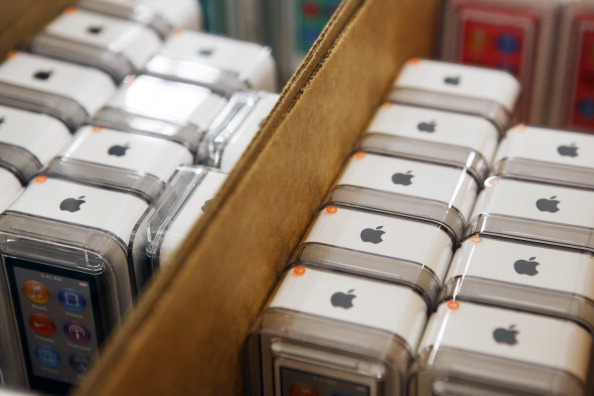 Apple Inc. ipods are arranged for sale before a Target Corp. store opening ahead of Black Friday in Chicago, Illinois, U.S., on Thursday, Nov. 28, 2013. U.S. retailers will kick off holiday shopping earlier than ever this year as stores prepare to sell some discounted items at a loss in a battle for consumers. Photographer: Patrick T. Fallon/Bloomberg via Getty Images