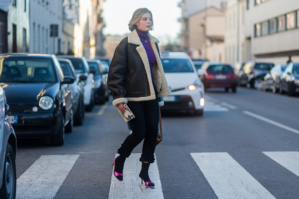 MILAN, ITALY - JANUARY 14: Claire Beermann is wearing a inner lining jacket, heels with socks, cropped pants seen at Diesel during Milan Men's Fashion Week Fall/Winter 2017/18 on January 14, 2017 in Milan, Italy. (Photo by Christian Vierig/Getty Images)